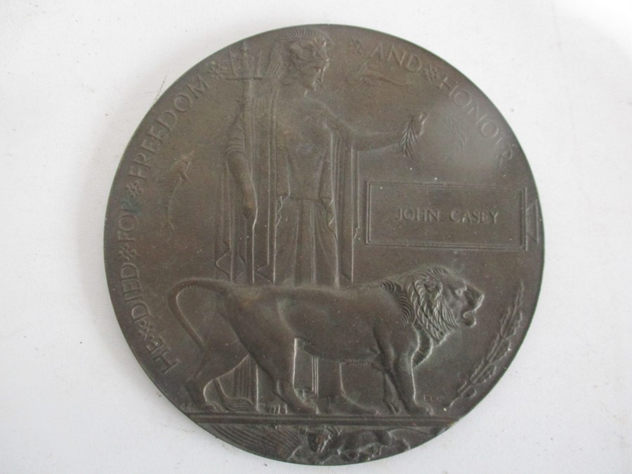 A WWI "Death Penny awarded to John Casey, WWI medal to 27190 Private JW Protheroe, Northumberland - Image 2 of 13