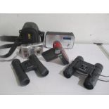 Various cameras, binoculars and a digital radio