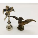 A silver plated seal with cherub and bronze eagle finial.