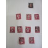 A stamp album containing various Victorian - 1970's British stamps including a Penny Black, Penny