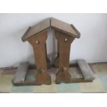 A pair of small oak ecclesiastical lecterns - 83cm Height