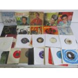 A collection 7" singles including Elvis Presley, Queen, David Bowie, The Beatles, Simple Minds, John