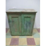 A part painted two door cupboard A/F
