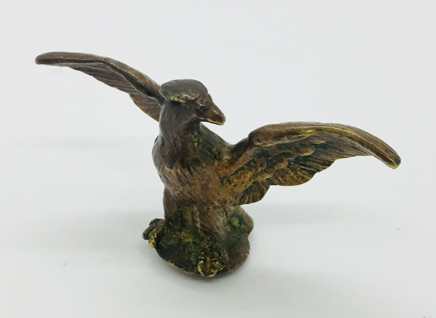 A silver plated seal with cherub and bronze eagle finial. - Image 3 of 5