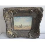 An Edwardian style print of a beach scene in ornate plaster frame, 40 cm x 45 cm