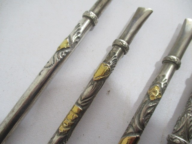 Five continental 800 silver 'opium spoons'/mate spoons some with overlaid gold decoration and one - Image 5 of 10