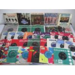 A collection of 1960's 7" vinyl singles including The Beatles, Bob Dylan, The Hollies, Pink Floyd,
