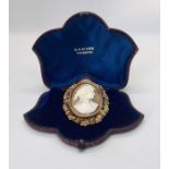 A Victorian cased cameo in gold coloured filigree setting