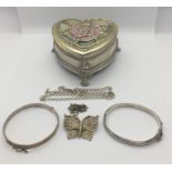 A small collection of silver and other jewellery including bangles etc. in heart shaped box