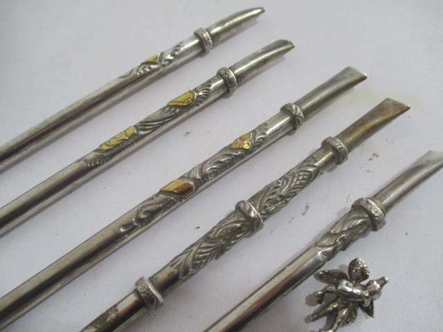 Five continental 800 silver 'opium spoons'/mate spoons some with overlaid gold decoration and one - Image 4 of 10