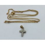 A 9 ct gold chain with 9 ct cross set with diamond chips, total weight 3.6g