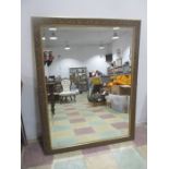 A large gilt mirror, 134cm x 104cm