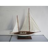 A model yacht on stand