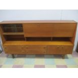 A mid century teak wall cabinet