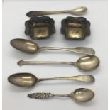 A pair of hallmarked silver salts along with four silver spoons and one other