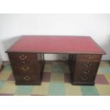 A Victorian knee hole desk