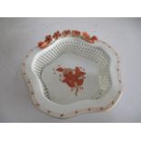 A Herend small dish with floral encrusted edge and lattice worked sides
