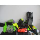 Three scuba diving outfits along with other equipment, flippers, goggles, torch etc