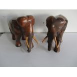 A pair of hardwood elephant figures - 28cm Height