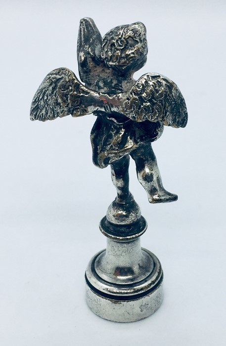 A silver plated seal with cherub and bronze eagle finial. - Image 4 of 5