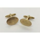 A pair of 9ct gold cufflinks. Weight 10.1g