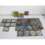 A collection of magic lantern slides including Mickey Mouse