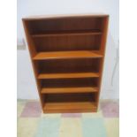 A teak freestanding bookcase