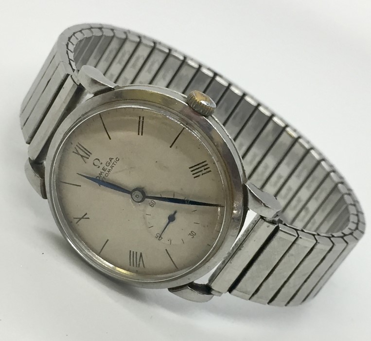 An Omega automatic stainless steel wristwatch on replacement expanding strap.