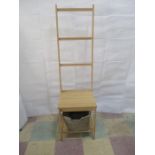 A "Bathroom Butler" chair with built in towel rail and basket under