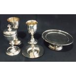 A five piece silver plated Communion set consisting of Chalices, Paten etc.