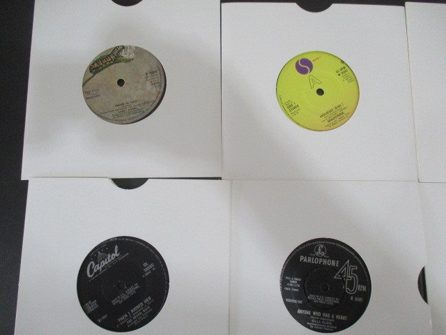A collection of 7" vinyl singles including The Beatles, Robert Plant, The Jam, Free, Madonna, - Image 21 of 42