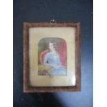 A Victorian miniature watercolour of a lady in velvet frame