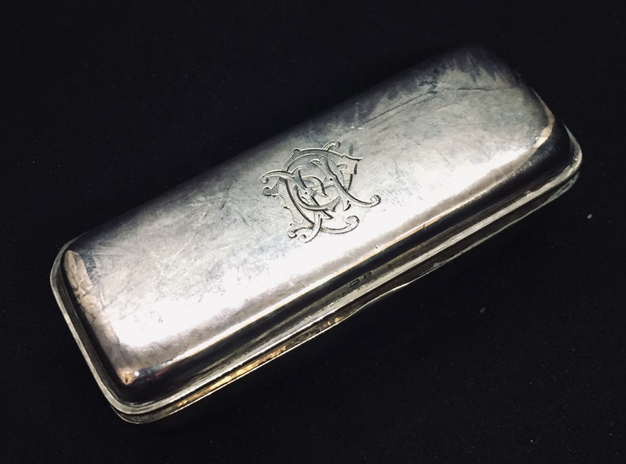 A hallmarked silver stud box with velvet lining by Lawrence Emanuel, Birmingham 1901.