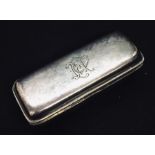 A hallmarked silver stud box with velvet lining by Lawrence Emanuel, Birmingham 1901.