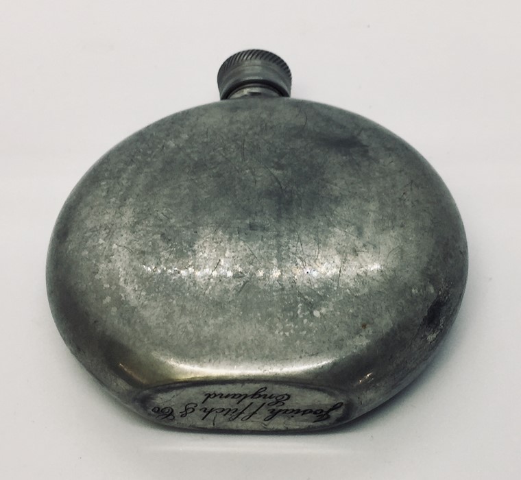 A pewter flask with inset panel depicting a hunting scene inscribed to base Josiah Ffitch & Co. - Image 5 of 7