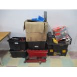 A quantity of tools and accessories including socket sets, saw blades, car jacks, wall paper