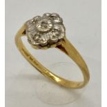 An 18ct gold diamond cluster ring