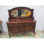 A mahogany mirrored back sideboard