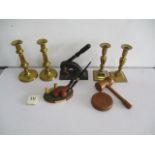 Two pairs of brass candlesticks, along with a paper embosser, wooden gavel etc