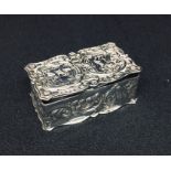 A repousse decorated snuff box by William Manton