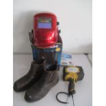 A Work Zone auto dimming welding helmet, along with a pair of Site waterproof boots - size 9 and a