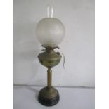 A Victorian brass oil lamp converted to electric