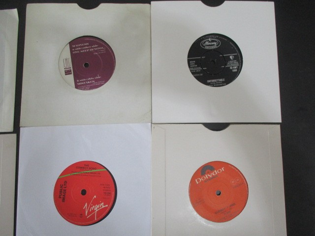 A collection of 7" vinyl singles including The Beatles, Robert Plant, The Jam, Free, Madonna, - Image 19 of 42