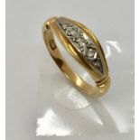 An 18 ct gold "boat" ring with diamonds