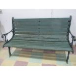 A garden bench with cast iron ends