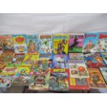 A collection of vintage children's annuals including Sindy, Thunderbirds, Beano's, Victor for