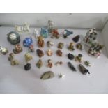 A collection of china and other ornaments including animals, fairings etc, some A/F