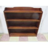 A mahogany freestanding bookcase