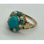 A Victorian turquoise and seed pearl ring set in 9ct gold. Size L