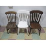 A Victorian slat back dining chair along with two stick back chairs